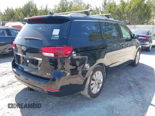 2017 Kia Sedona EX with VIN KNDMC5C13H6263232, listed as a IAAI auction lot 41733170 with 102,026 mi miles. Bid and sale history available at carsss.com. Image 4.