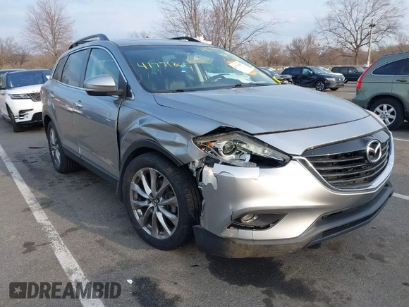 2015 Mazda CX-9 Grand Touring with VIN JM3TB3DA6F0447184, listed as a IAAI auction lot 41771865 with 137,814 mi miles. Bid and sale history available at carsss.com. Image 1.