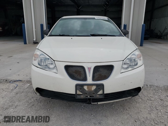 2006 Pontiac G6 1SV with VIN 1G2ZF55BX64264023, listed as a Copart auction lot 57665925 with 136,134 mi miles and Salvage title. Bid and sale history available at DreamBid. Image 5.