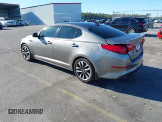 2015 Kia Optima SX Turbo with VIN 5XXGR4A66FG382167, listed as a IAAI auction lot 40951399 with 77,083 mi miles and . Bid and sale history available at DreamBid. Image 3.