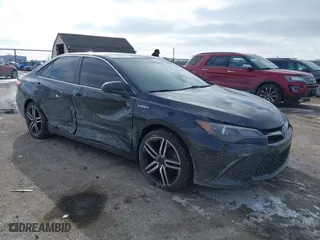 2015 Toyota Camry Hybrid LE with VIN 4T1BD1FK5FU166653, listed as a IAAI auction lot 41412963 with 105,428 mi miles. Bid and sale history available at carsss.com. Image 1.