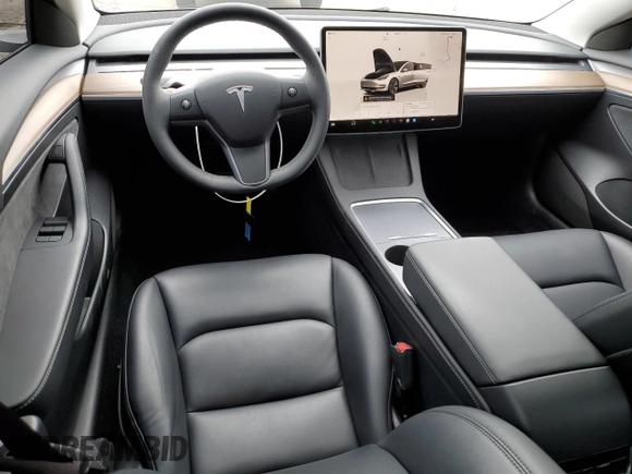 2023 Tesla Model 3 z VIN 5YJ3E1EA3PF620536, wystawiony jako Copart lot #54509885 z przebiegiem 11 483 mil mil oraz Szkoda całkowita • Salvage title. Historia ofert i sprzedaży dostępna na DreamBid. Obrazek 8.