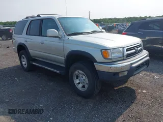 2000 Toyota 4Runner SR5 z VIN JT3HN86R7Y0290729, wystawiony jako IAAI lot #42409622 z przebiegiem 315 804 mil mil oraz . Historia ofert i sprzedaży dostępna na DreamBid. Obrazek 1.
