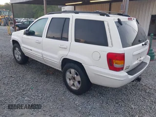 2001 Jeep Grand Cherokee Limited with VIN 1J4GW58N71C506901, listed as a IAAI auction lot 42079198 with Not Provided miles and . Bid and sale history available at DreamBid. Image 3.