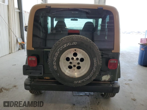 1998 Jeep Wrangler Sahara z VIN 1J4FY49S4WP728476, wystawiony jako Copart lot #53490515 z przebiegiem 272 058 mil mil oraz Czysty tytuł • Clean title. Historia ofert i sprzedaży dostępna na DreamBid. Obrazek 6.
