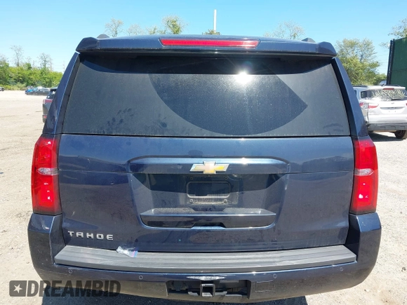 2020 Chevrolet Tahoe LT with VIN 1GNSKBKC6LR239081, listed as a IAAI auction lot 42298842 with 125,328 mi miles and . Bid and sale history available at DreamBid. Image 16.