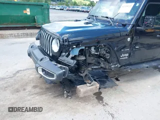 2021 Jeep Wrangler Unlimited Sahara with VIN 1C4HJXEN4MW610287, listed as a IAAI auction lot 42538525 with 24,861 mi miles and . Bid and sale history available at DreamBid. Image 6.