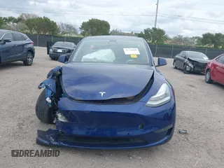 2022 Tesla Model Y Long Range z VIN 7SAYGDEE9NA002493, wystawiony jako IAAI lot #41756460 z przebiegiem 68 315 mil mil oraz . Historia ofert i sprzedaży dostępna na DreamBid. Obrazek 11.
