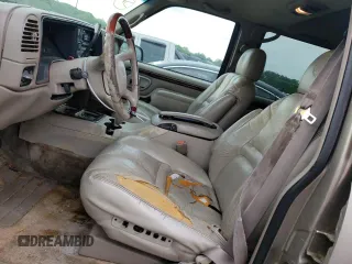 1999 Cadillac Escalade z VIN 1GYEK13RXXR408201, wystawiony jako Copart lot #53805845 z przebiegiem 268 205 mil mil oraz Szkoda całkowita • Salvage title. Historia ofert i sprzedaży dostępna na DreamBid. Obrazek 7.