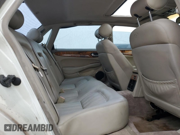 1998 Jaguar XJ with VIN SAJHX1248WC835728, listed as a Copart auction lot 86698244 with 116,768 mi miles and Clean title. Bid and sale history available at DreamBid. Image 10.