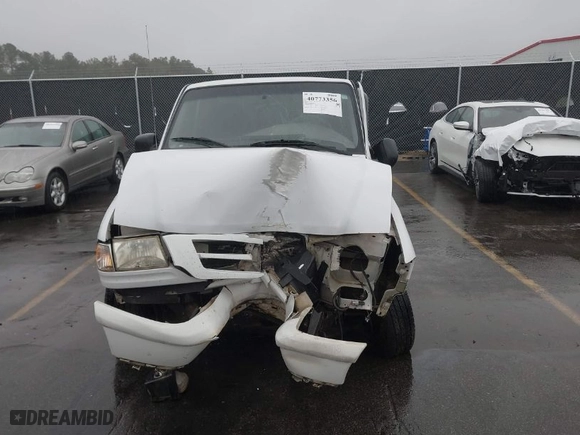2002 Mazda B-Series 2WD Truck DS with VIN 4F4YR12U82TM11900, listed as a IAAI auction lot 40773356 with 118,353 mi miles. Bid and sale history available at carsss.com. Image 12.