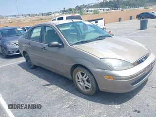 2003 Ford Focus with VIN 1FAHP34Z43W284930, listed as a IAAI auction lot 42152784 with 165,769 mi miles and . Bid and sale history available at DreamBid. Image 1.