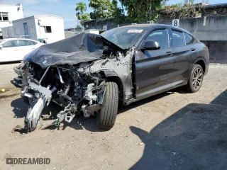 2023 BMW X4 xDrive30i with VIN 5UX33DT03P9P56353, listed as a Copart auction lot 38783133 with 2,903 mi miles. Bid and sale history available at carsss.com. Image 1.