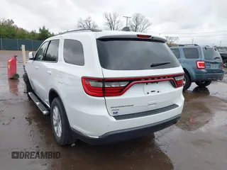 2015 Dodge Durango SXT with VIN 1C4RDJAG8FC239977, listed as a IAAI auction lot 40764725 with 133,809 mi miles and . Bid and sale history available at carsss.com. Image 3.