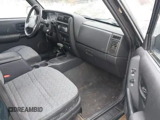 1999 Jeep Cherokee Sport with VIN 1J4FF68S8XL554570, listed as a IAAI auction lot 41737417 with 98,678 mi miles and . Bid and sale history available at DreamBid. Image 5.