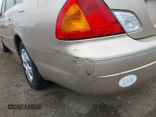 2001 Toyota Avalon XL z VIN 4T1BF28B41U172837, wystawiony jako IAAI lot #42350664 z przebiegiem 150 111 mil mil oraz . Historia ofert i sprzedaży dostępna na DreamBid. Obrazek 13.