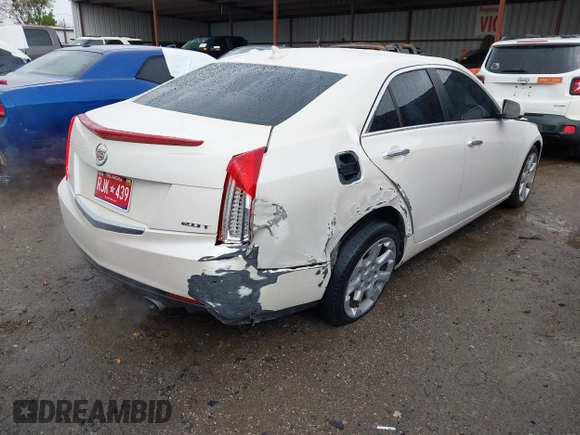 2013 Cadillac ATS z VIN 1G6AA5RX9D0156125, wystawiony jako IAAI lot #41964124 z przebiegiem 139 869 mil mil oraz . Historia ofert i sprzedaży dostępna na DreamBid. Obrazek 4.