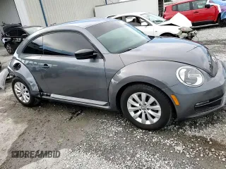 2014 Volkswagen Beetle Entry z VIN 3VWF17AT2EM642942, wystawiony jako Copart lot #60241445 z przebiegiem 70 780 mil mil oraz Szkoda całkowita • Salvage title. Historia ofert i sprzedaży dostępna na DreamBid. Obrazek 14.