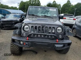 2018 Jeep Wrangler Unlimited Sahara with VIN 1C4BJWEG4JL822007, listed as a Copart auction lot 61450915 with 91,148 mi miles and Salvage title. Bid and sale history available at DreamBid. Image 5.