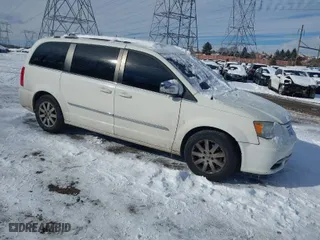 2012 Chrysler Town & Country Touring-L with VIN 2C4RC1CG5CR125275, listed as a IAAI auction lot 41376571 with 215256 miles. Bid and sale history available at carsss.com. Image 1.