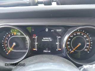 2021 Jeep Gladiator Overland z VIN 1C6HJTFG1ML606215, wystawiony jako IAAI lot #41771646 z przebiegiem 77 411 mil mil oraz . Historia ofert i sprzedaży dostępna na DreamBid. Obrazek 7.