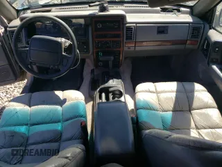 1994 Jeep Grand Cherokee Limited with VIN 1J4GZ78Y0RC190766, listed as a Copart auction lot 54628055 with 217,270 mi miles and Salvage title. Bid and sale history available at DreamBid. Image 8.