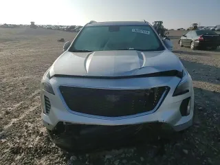 2021 Cadillac XT4 AWD Sport with VIN 1GYFZFR48MF007798, listed as a Copart auction lot 86557574 with 29,462 mi miles and Salvage title. Bid and sale history available at DreamBid. Image 12.