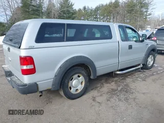 2007 Ford F-150 XL with VIN 1FTRF12W67NA40142, listed as a IAAI auction lot 41617797 with 216,585 mi miles. Bid and sale history available at carsss.com. Image 4.