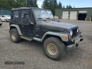 1998 Jeep Wrangler Sport z VIN 1J4FY19S7WP801709, wystawiony jako Copart lot #64495985 z przebiegiem 260 798 mil mil oraz Czysty tytuł • Clean title. Historia ofert i sprzedaży dostępna na DreamBid. Obrazek 4.