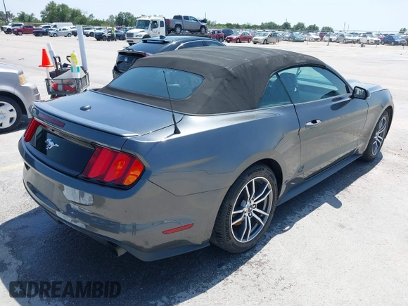 2016 Ford Mustang EcoBoost Premium z VIN 1FATP8UHXG5299412, wystawiony jako IAAI lot #42202822 z przebiegiem 121 693 mil mil oraz . Historia ofert i sprzedaży dostępna na DreamBid. Obrazek 4.
