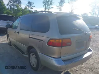 2000 Toyota Sienna LE with VIN 4T3ZF13C1YU301224, listed as a IAAI auction lot 42176695 with 203,971 mi miles and . Bid and sale history available at DreamBid. Image 3.