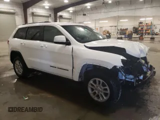 2020 Jeep Grand Cherokee Laredo E with VIN 1C4RJFAG2LC268005, listed as a Copart auction lot 52321235 with 63,285 mi miles and Salvage Title. Bid and sale history available at carsss.com. Image 4.