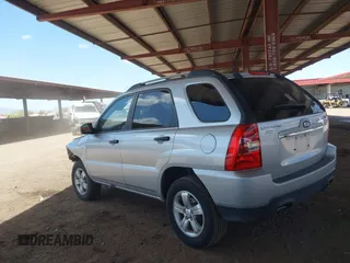 2009 Kia Sportage LX with VIN KNDJF724297601801, listed as a IAAI auction lot 42063474 with 87,869 mi miles. Bid and sale history available at carsss.com. Image 3.
