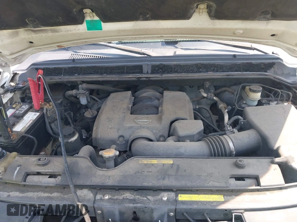 2005 Nissan Titan SE z VIN 1N6BA07A35N554676, wystawiony jako IAAI lot #42593107 z przebiegiem 200 541 mil mil oraz . Historia ofert i sprzedaży dostępna na DreamBid. Obrazek 10.