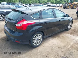 2014 Ford Focus Titanium with VIN 1FADP3N2XEL319782, listed as a IAAI auction lot 42615481 with 132,423 mi miles and . Bid and sale history available at DreamBid. Image 4.