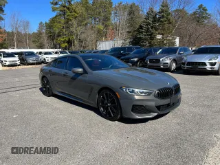 2021 BMW 8 Series 840i with VIN WBAGV2C02MCE96480, listed as a Copart auction lot 46827324 with 98,148 mi miles. Bid and sale history available at carsss.com. Image 2.