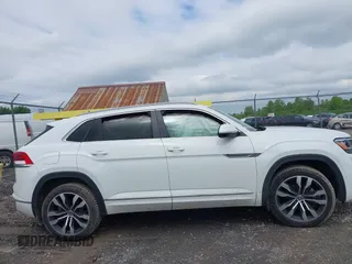 2021 Volkswagen Atlas SEL z VIN 1V2SE2CA7MC214805, wystawiony jako IAAI lot #42374591 z przebiegiem 61 775 mil mil oraz . Historia ofert i sprzedaży dostępna na DreamBid. Obrazek 14.