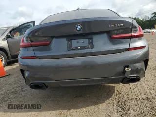 2022 BMW 3 Series M340i xDrive with VIN WBA5U9C02NFL65825, listed as a Copart auction lot 60244064 with 22,548 mi miles and Salvage Title. Bid and sale history available at DreamBid. Image 6.
