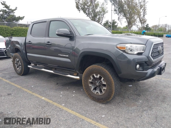 2018 Toyota Tacoma SR5 with VIN 3TMAZ5CN1JM071396, listed as a IAAI auction lot 42061640 with 122,148 mi miles and . Bid and sale history available at DreamBid. Image 1.