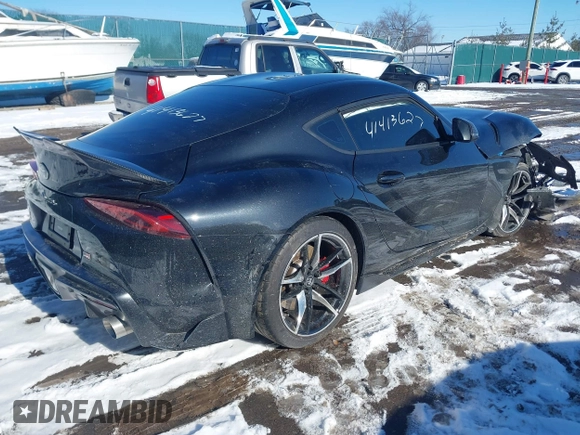 2021 Toyota Supra 3.0 with VIN WZ1DB0C03MW044148, listed as a IAAI auction lot 41413627 with 9,590 mi miles and . Bid and sale history available at DreamBid. Image 4.
