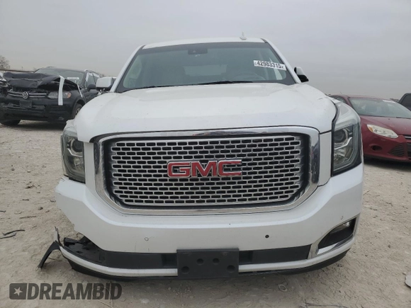 2016 GMC Yukon Denali with VIN 1GKS2CKJ8GR271098, listed as a Copart auction lot 42983315 with 109,582 mi miles and Salvage Title. Bid and sale history available at carsss.com. Image 5.