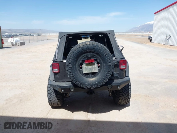 2014 Jeep Wrangler Unlimited Rubicon с VIN 1C4BJWFG2EL279938, выставлен на аукционе IAAI как лот 41920729 с пробегом 76 418 миль миль и . История ставок и продаж доступна на DreamBid. Изображение 17.