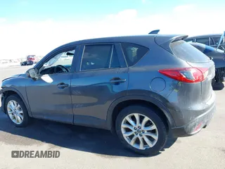 2014 Mazda CX-5 Grand Touring with VIN JM3KE4DY1E0364685, listed as a IAAI auction lot 41665349 with 135,751 mi miles. Bid and sale history available at carsss.com. Image 14.