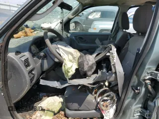 2005 Ford Escape XLS Value with VIN 1FMYU02Z75KB36684, listed as a Copart auction lot 69134684 with 0 mi miles and Non Repairable. Bid and sale history available at carsss.com. Image 7.