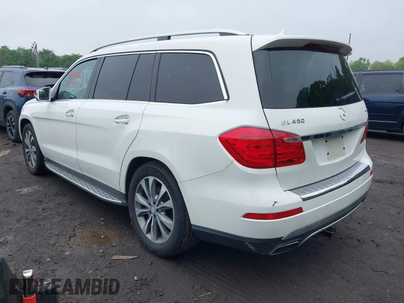 2014 Mercedes-Benz GL 450 with VIN 4JGDF7CE5EA408944, listed as a IAAI auction lot 42397384 with 182,106 mi miles and . Bid and sale history available at DreamBid. Image 3.