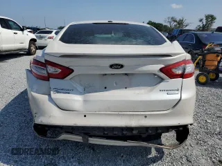 2014 Ford Fusion Titanium с VIN 3FA6P0K91ER373269, выставлен на аукционе Copart как лот 55870365 с пробегом 171 165 миль миль и Списание • Salvage title. История ставок и продаж доступна на DreamBid. Изображение 6.