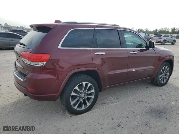 2017 Jeep Grand Cherokee Overland with VIN 1C4RJECG3HC868255, listed as a Copart auction lot 83041054 with 121,604 mi miles and Salvage Title. Bid and sale history available at carsss.com. Image 3.