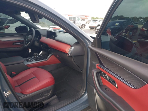 2025 Mazda CX-70 Premium Plus with VIN JM3KJEHA3S1126454, listed as a IAAI auction lot 42427454 with 5,648 mi miles and . Bid and sale history available at DreamBid. Image 5.