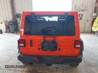 2023 Jeep Wrangler Sport with VIN 1C4HJXDG7PW676453, listed as a IAAI auction lot 42222995 with 32,347 mi miles and . Bid and sale history available at DreamBid. Image 16.