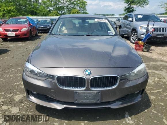 2013 BMW 3 Series 328i xDrive with VIN WBA3B5G58DNS02015, listed as a Copart auction lot 58586515 with 241,767 mi miles and Salvage title. Bid and sale history available at DreamBid. Image 5.